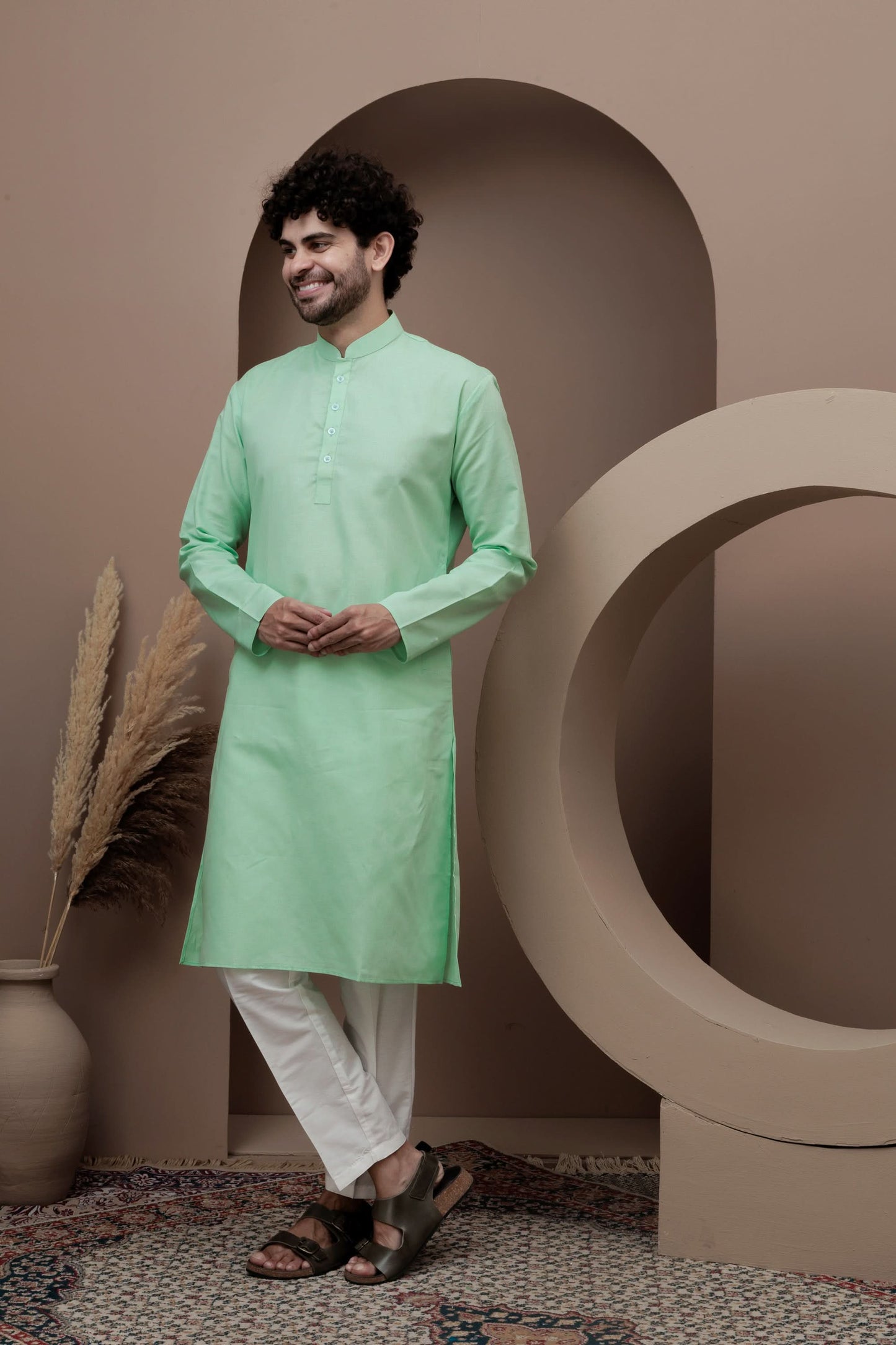 Green cotton silk kurta pajama for festive occasions