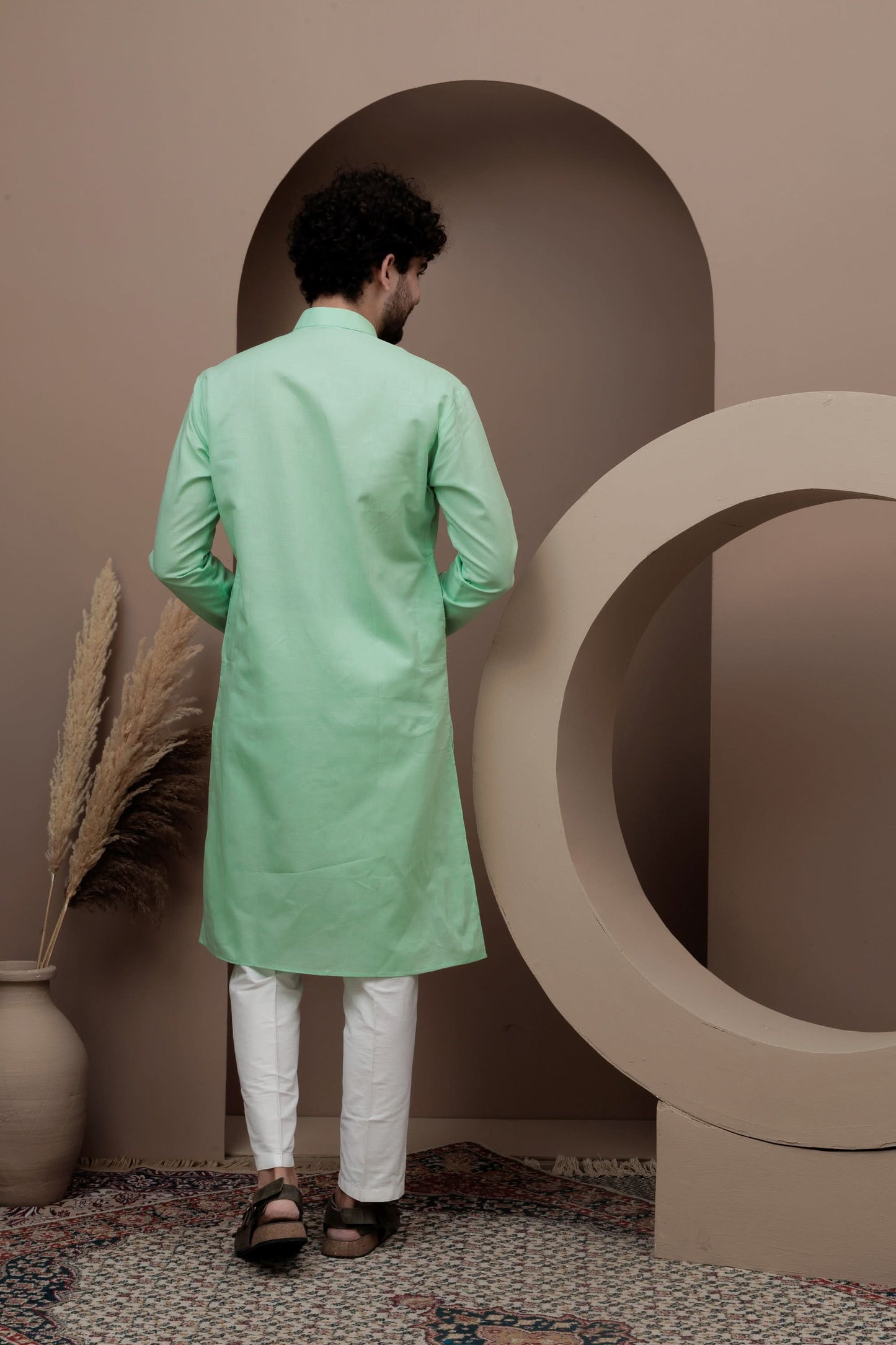 Green cotton silk kurta pajama for festive occasions
