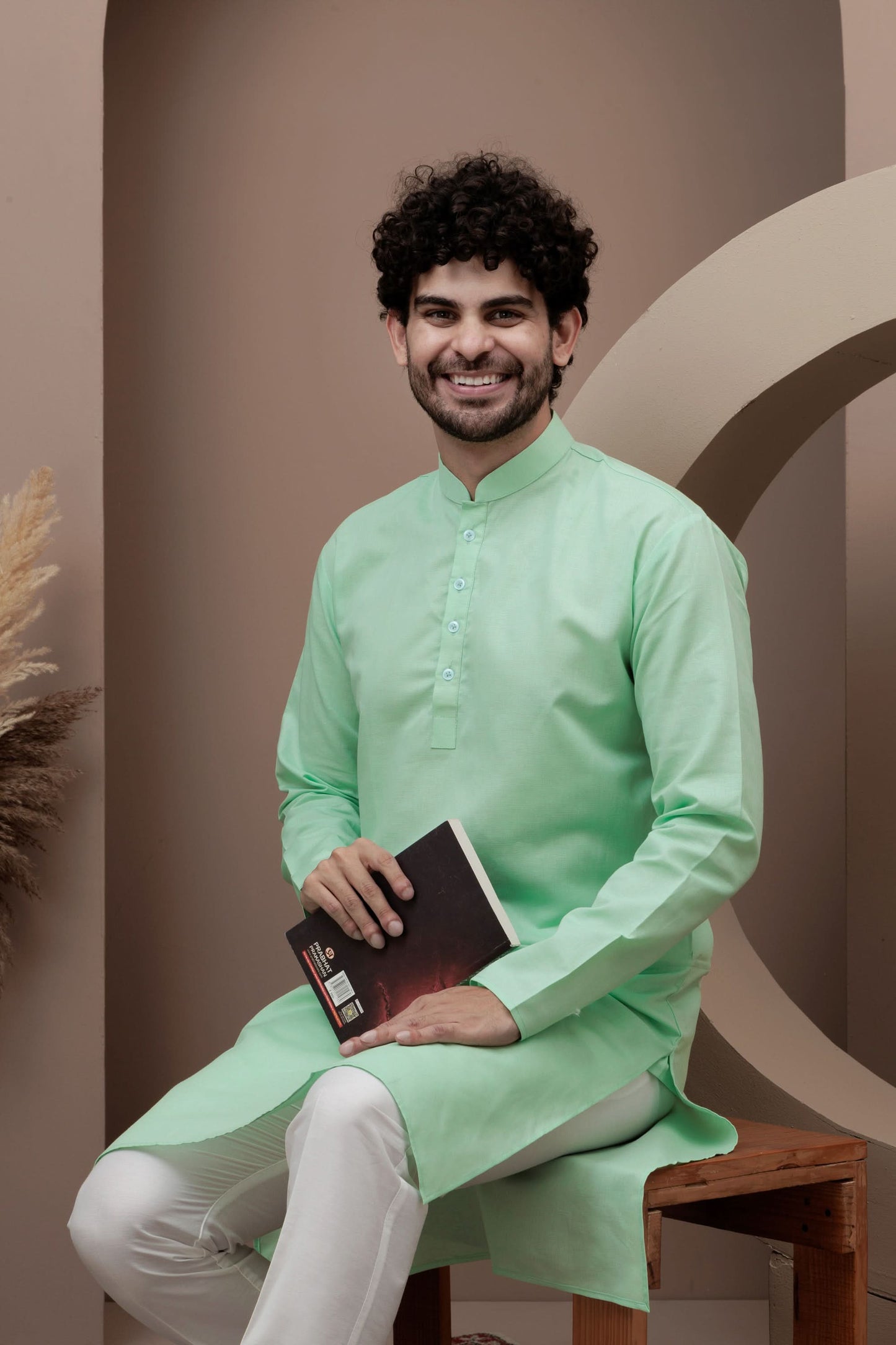 Green cotton silk kurta pajama for festive occasions