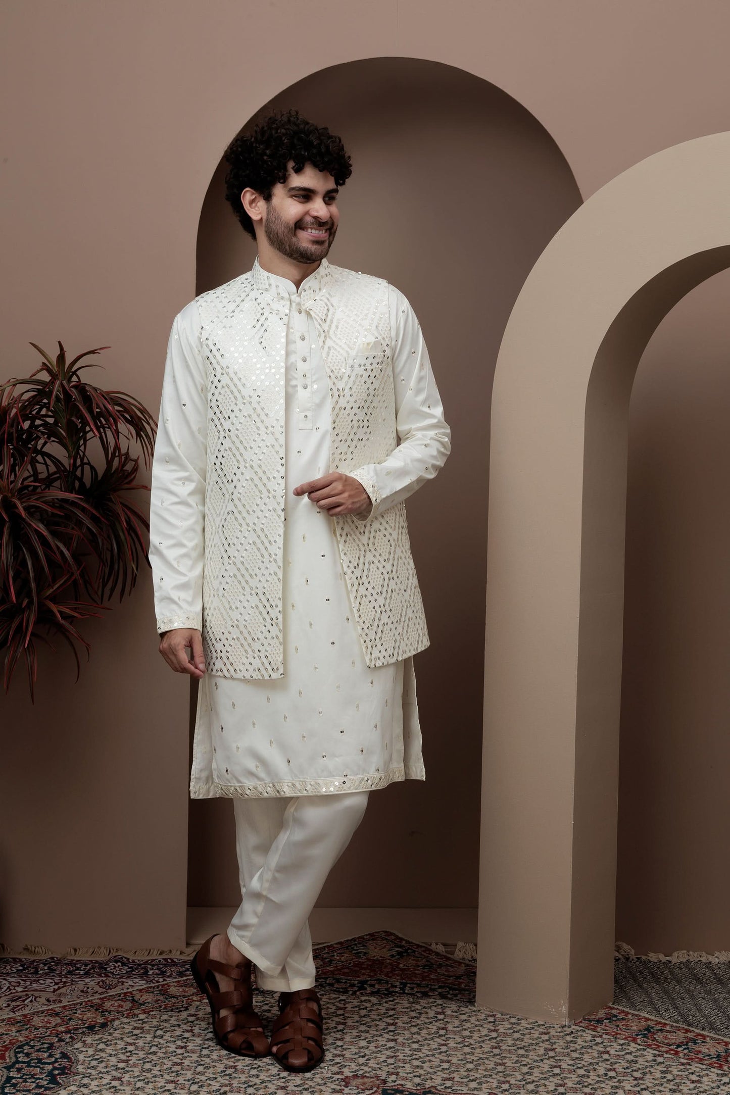 White kurta pajama with matching embroidered jacket