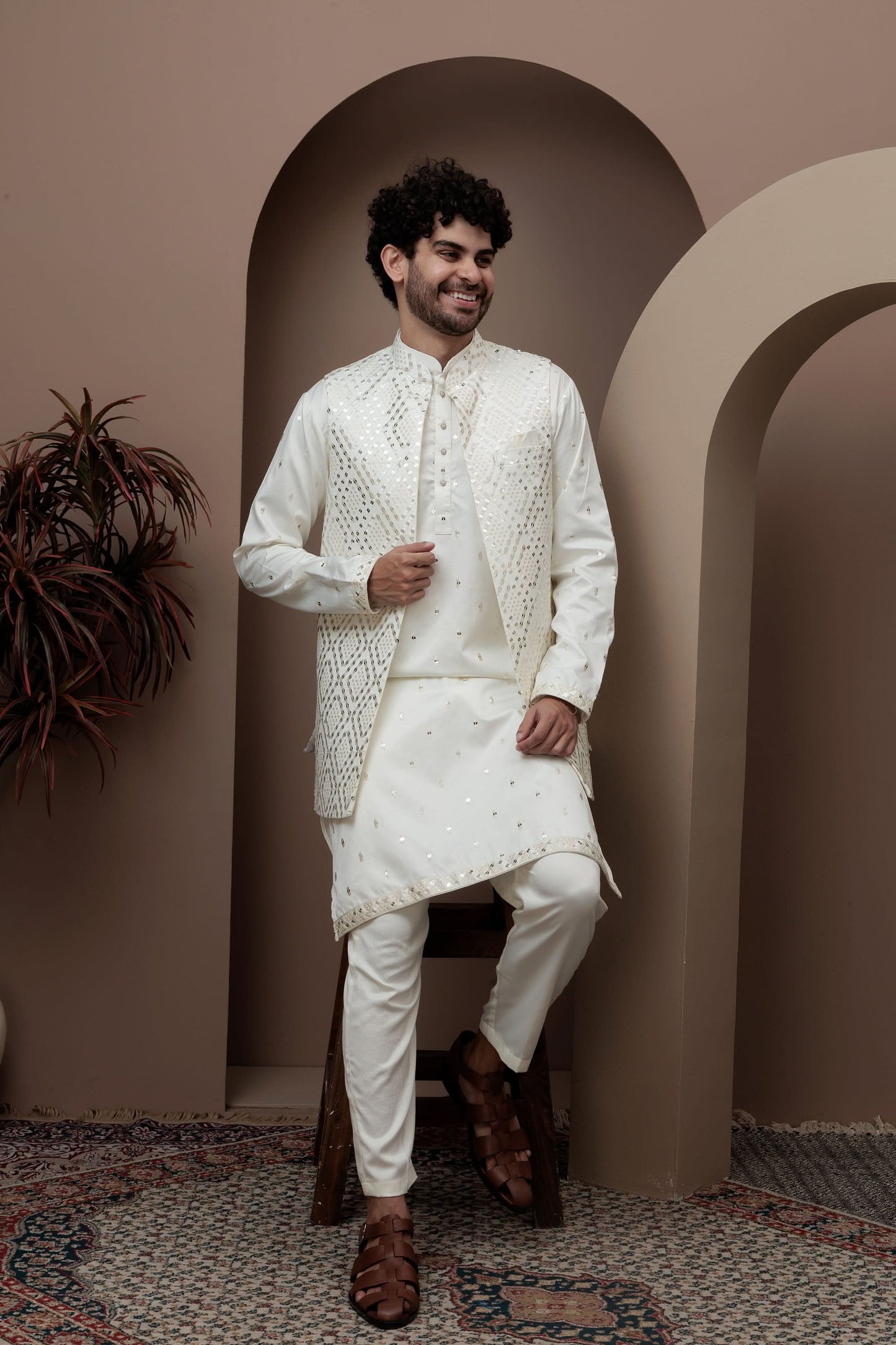 White kurta pajama with matching embroidered jacket