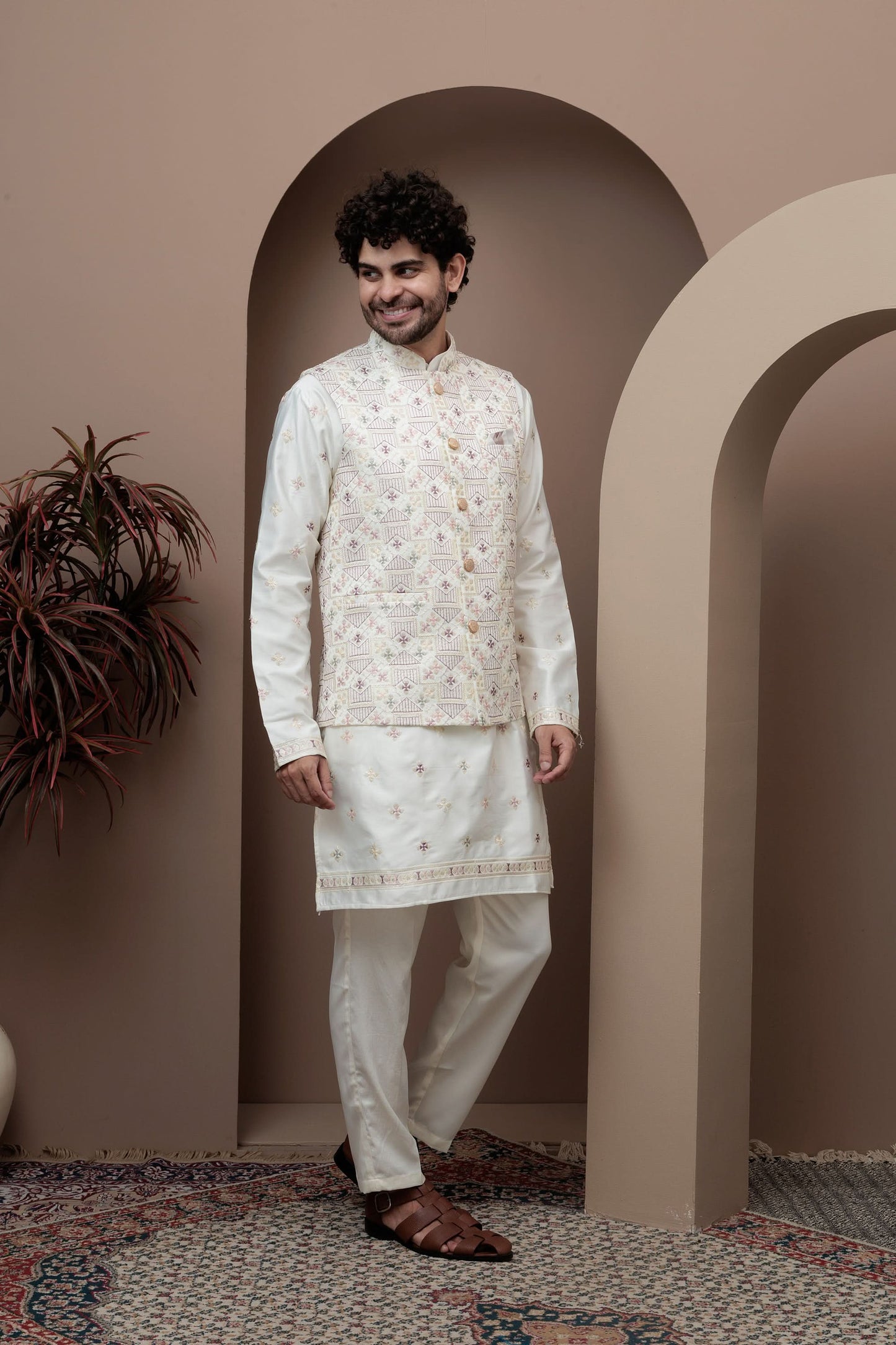 White kurta pajama with matching embroidered jacket