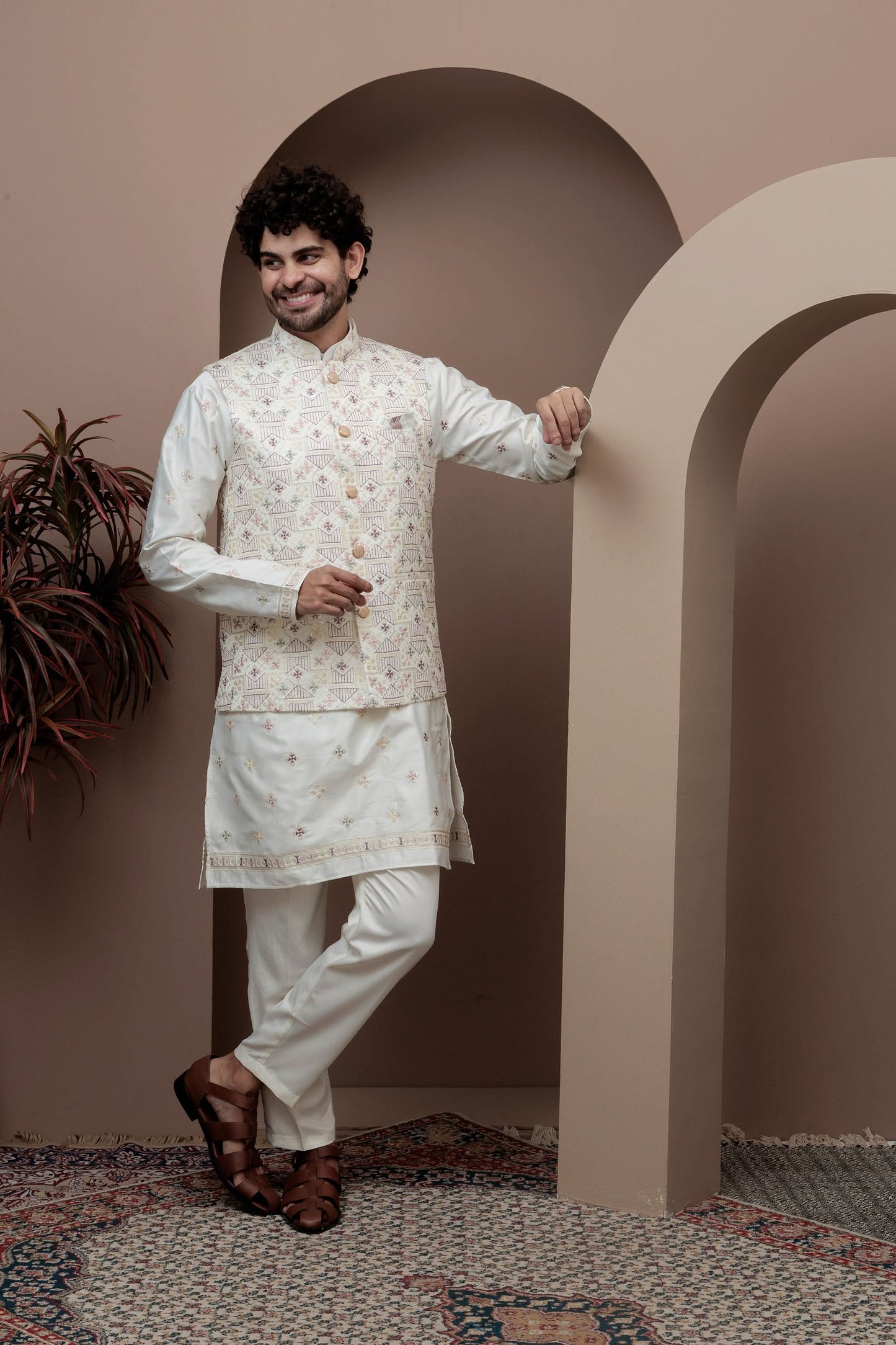 White kurta pajama with matching embroidered jacket