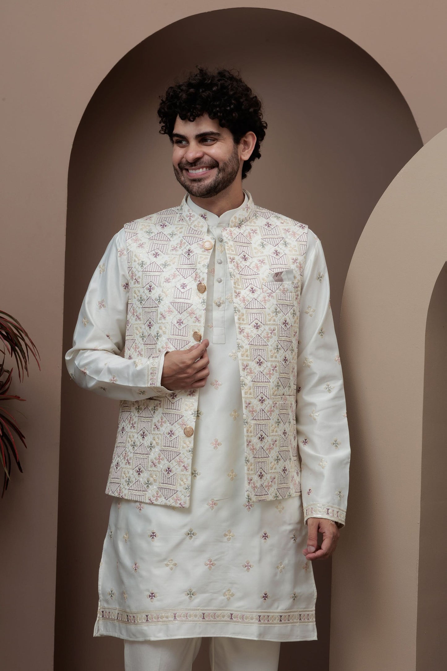 White kurta pajama with matching embroidered jacket