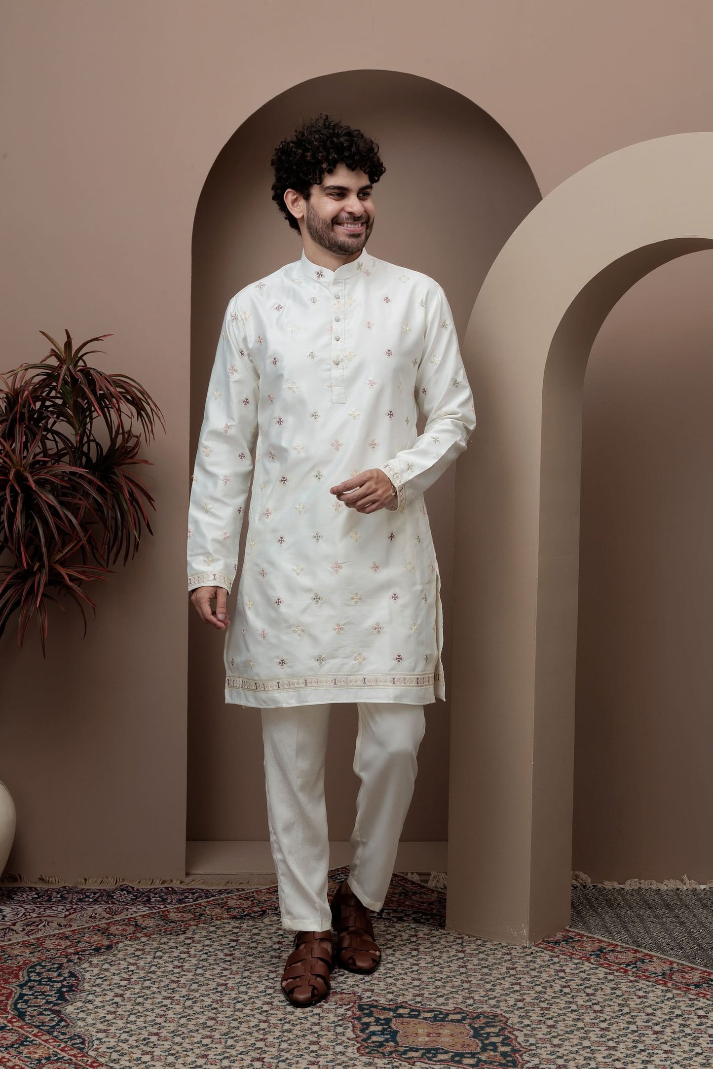 White kurta pajama with matching embroidered jacket