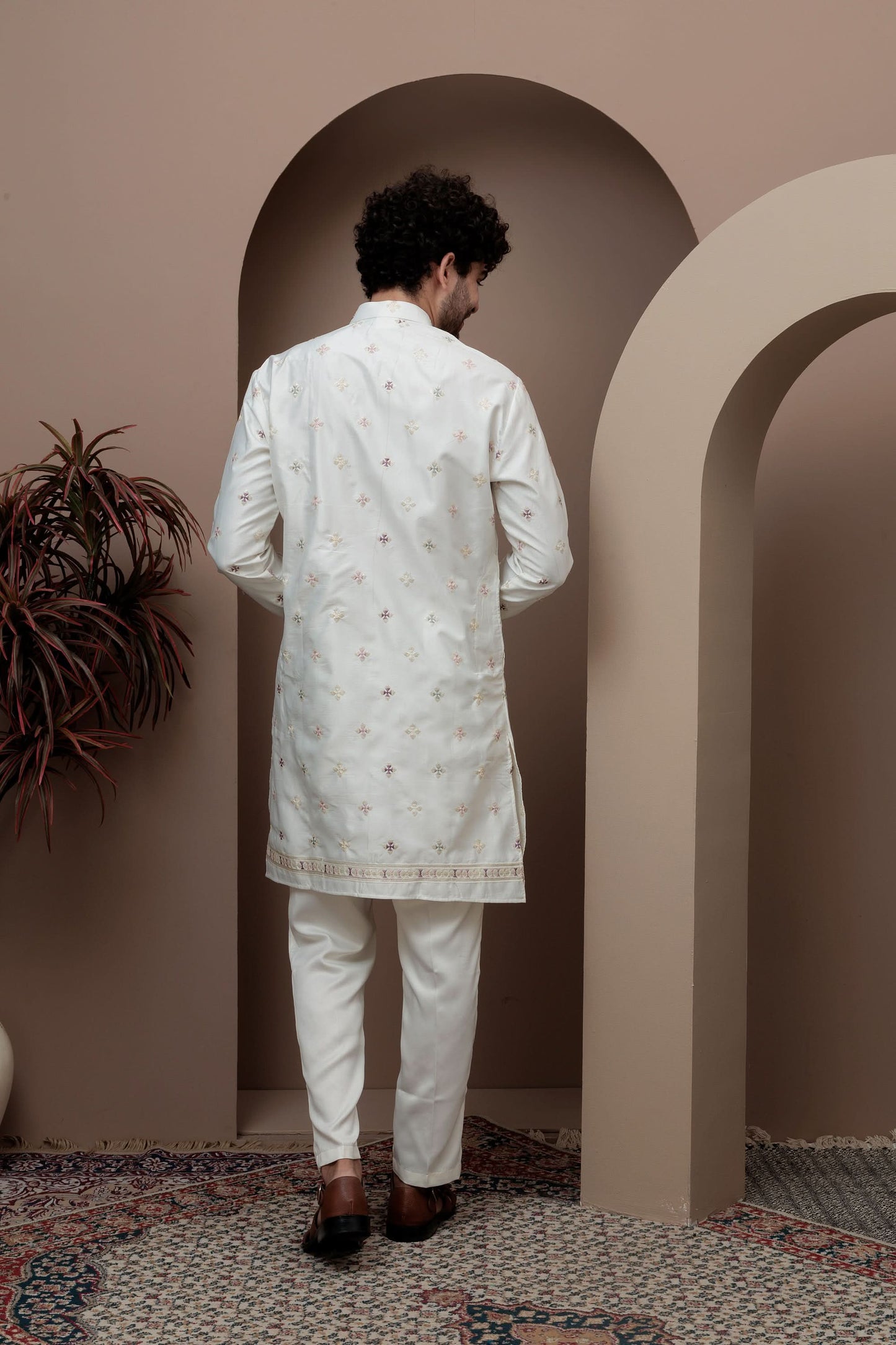 White kurta pajama with matching embroidered jacket
