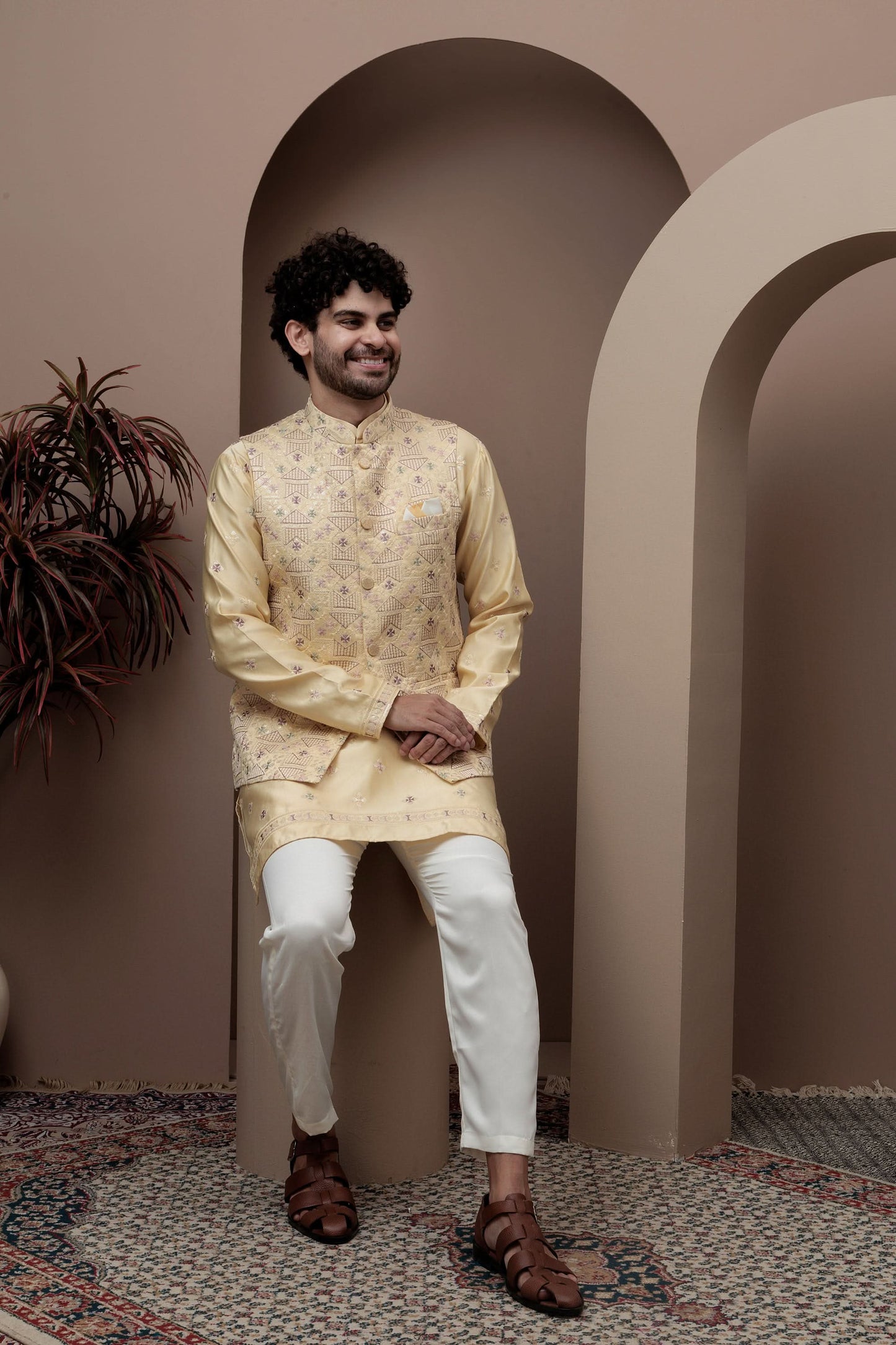 Yellow kurta pajama with matching embroidered jacket
