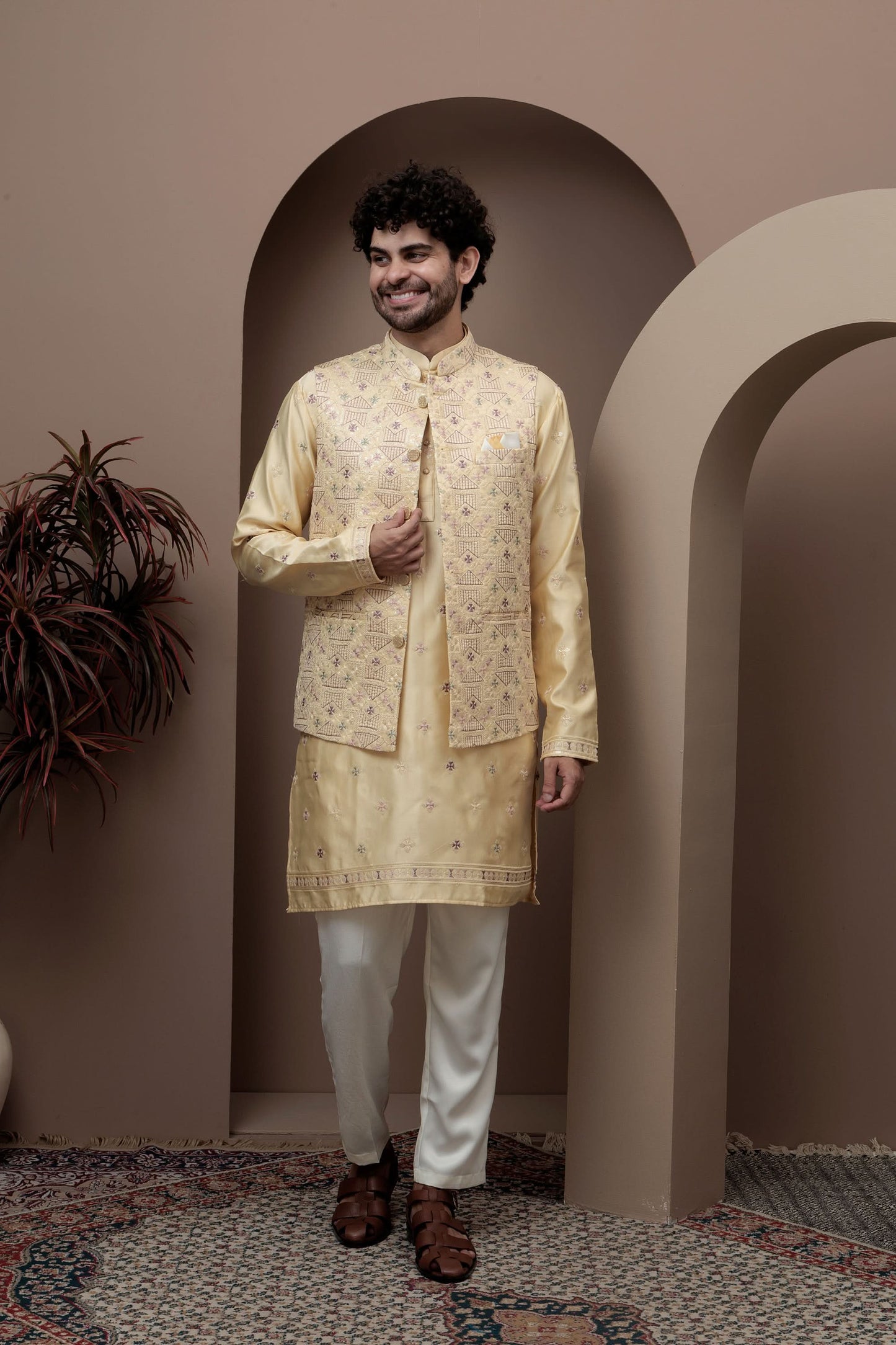 Yellow kurta pajama with matching embroidered jacket