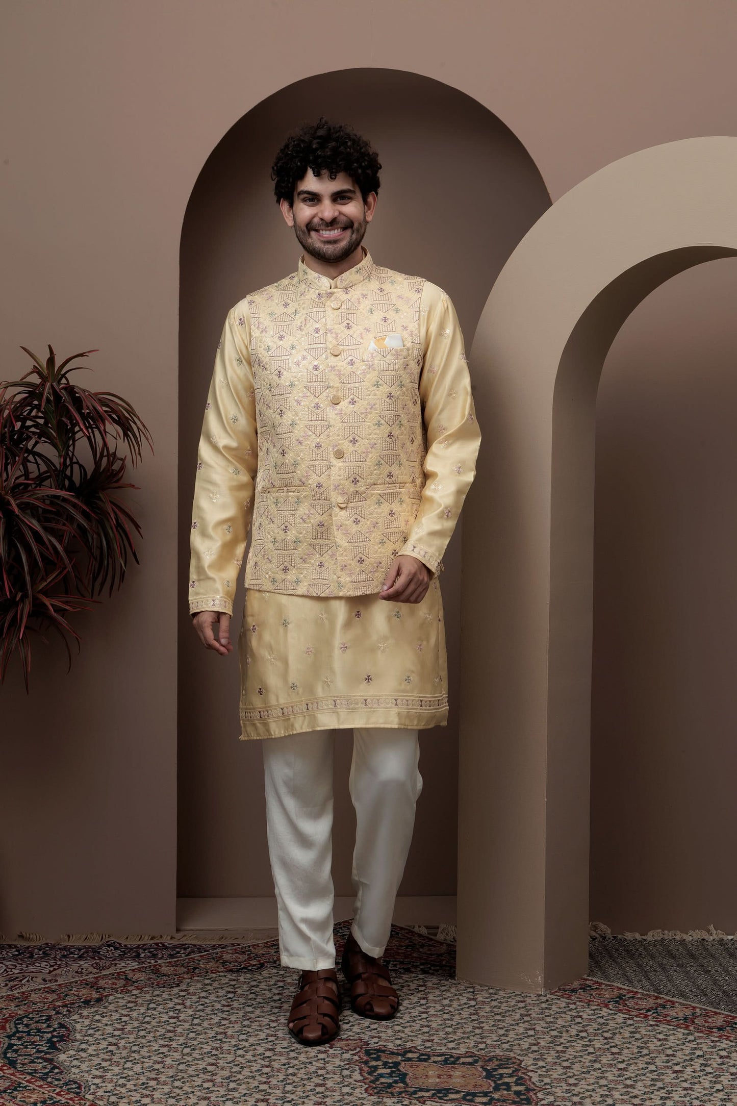 Yellow kurta pajama with matching embroidered jacket