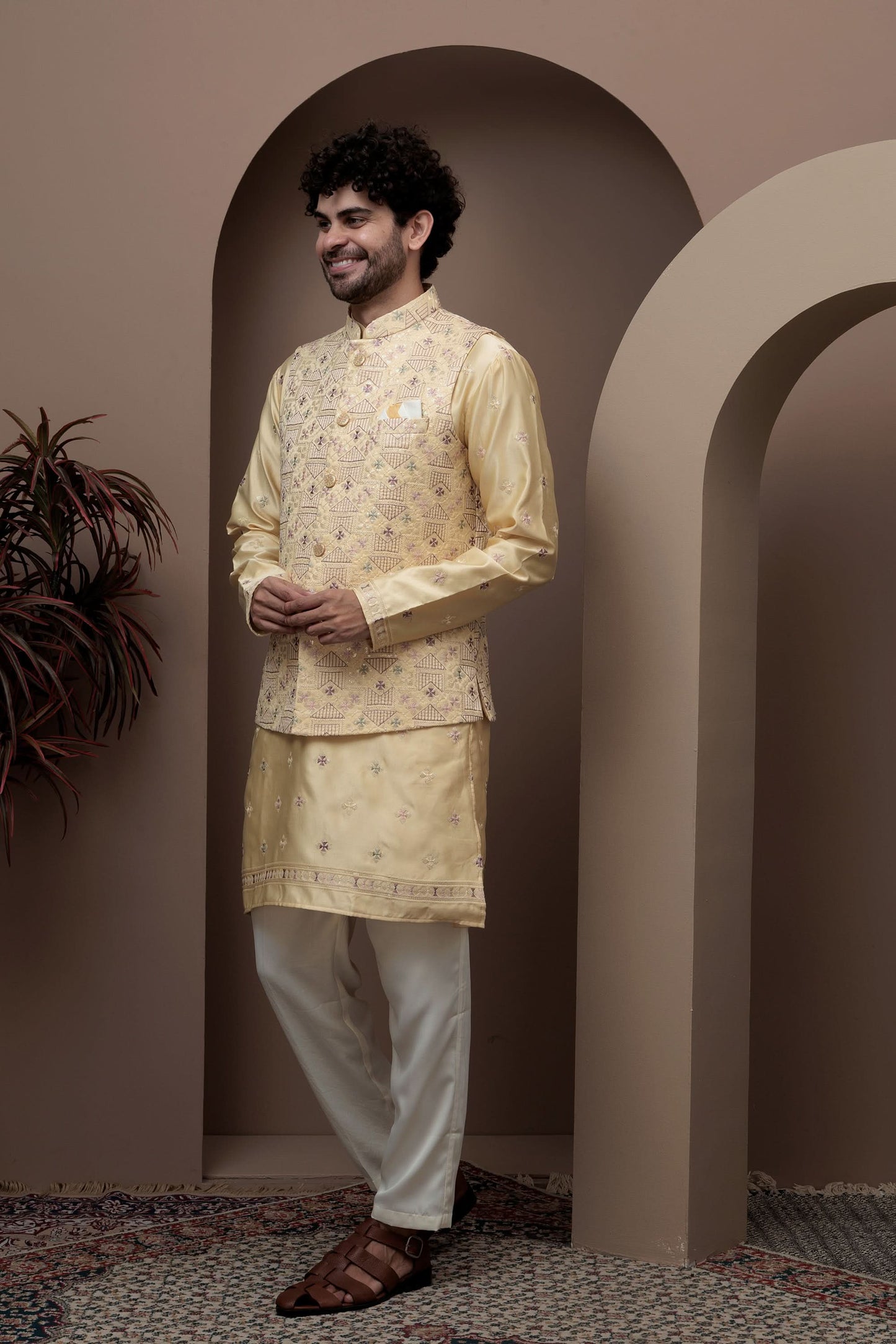 Yellow kurta pajama with matching embroidered jacket