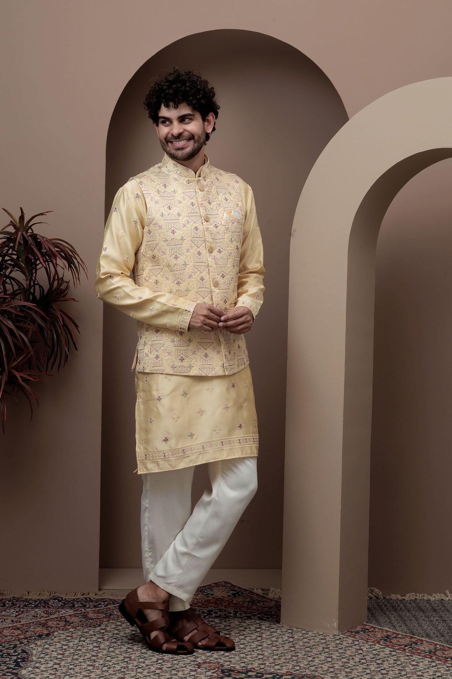 Yellow kurta pajama with matching embroidered jacket
