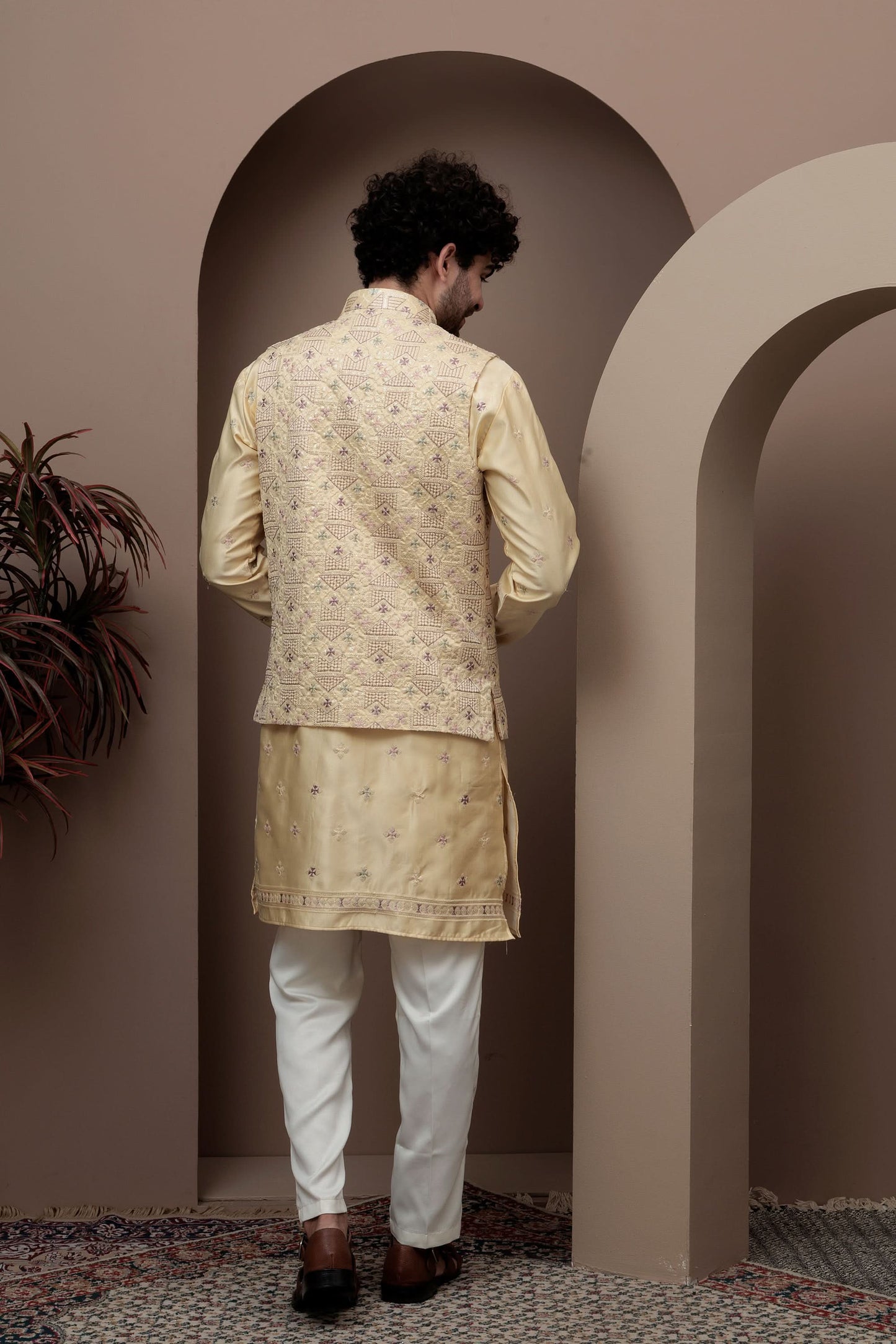 Yellow kurta pajama with matching embroidered jacket