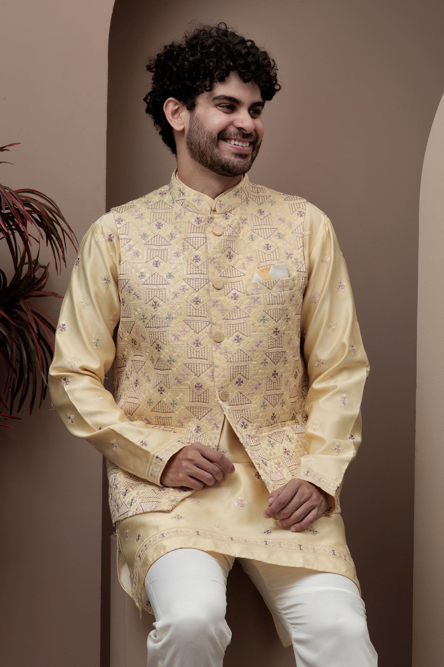 Yellow kurta pajama with matching embroidered jacket