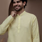 Yellow cotton silk kurta pajama for festive occasions