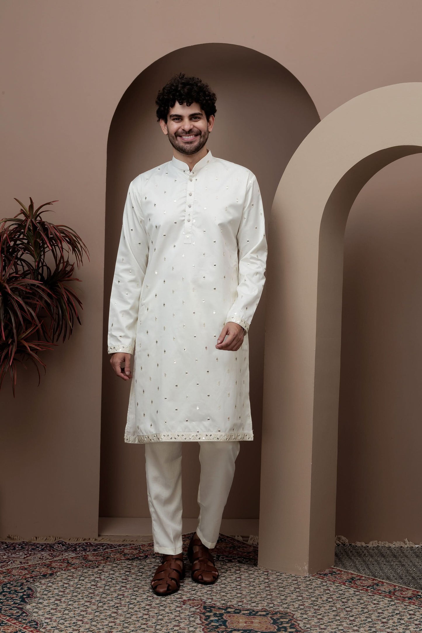 White kurta pajama with matching embroidered jacket