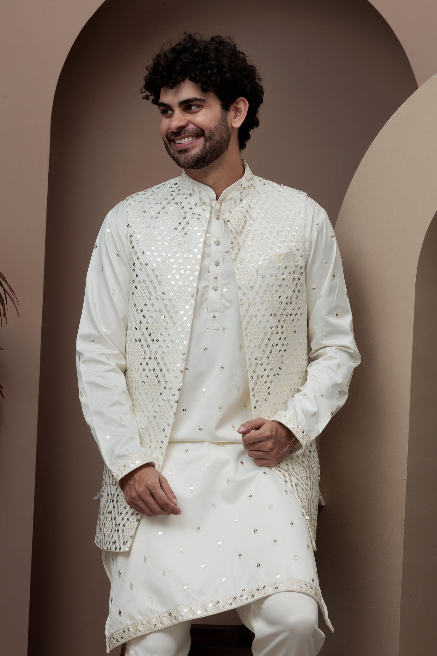 White kurta pajama with matching embroidered jacket