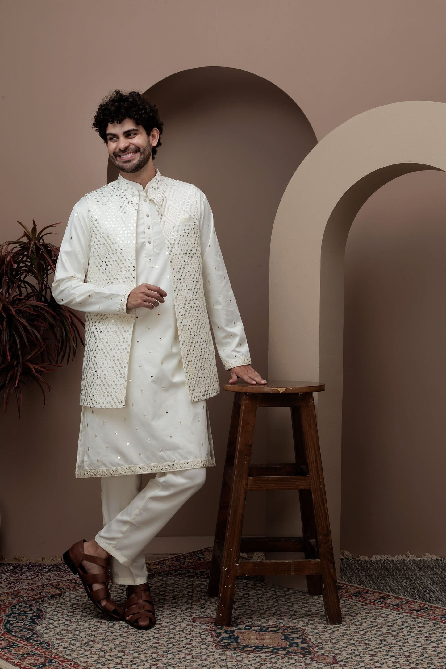 White kurta pajama with matching embroidered jacket