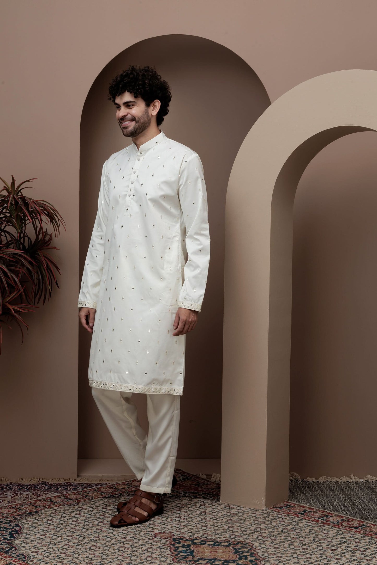 White kurta pajama with matching embroidered jacket