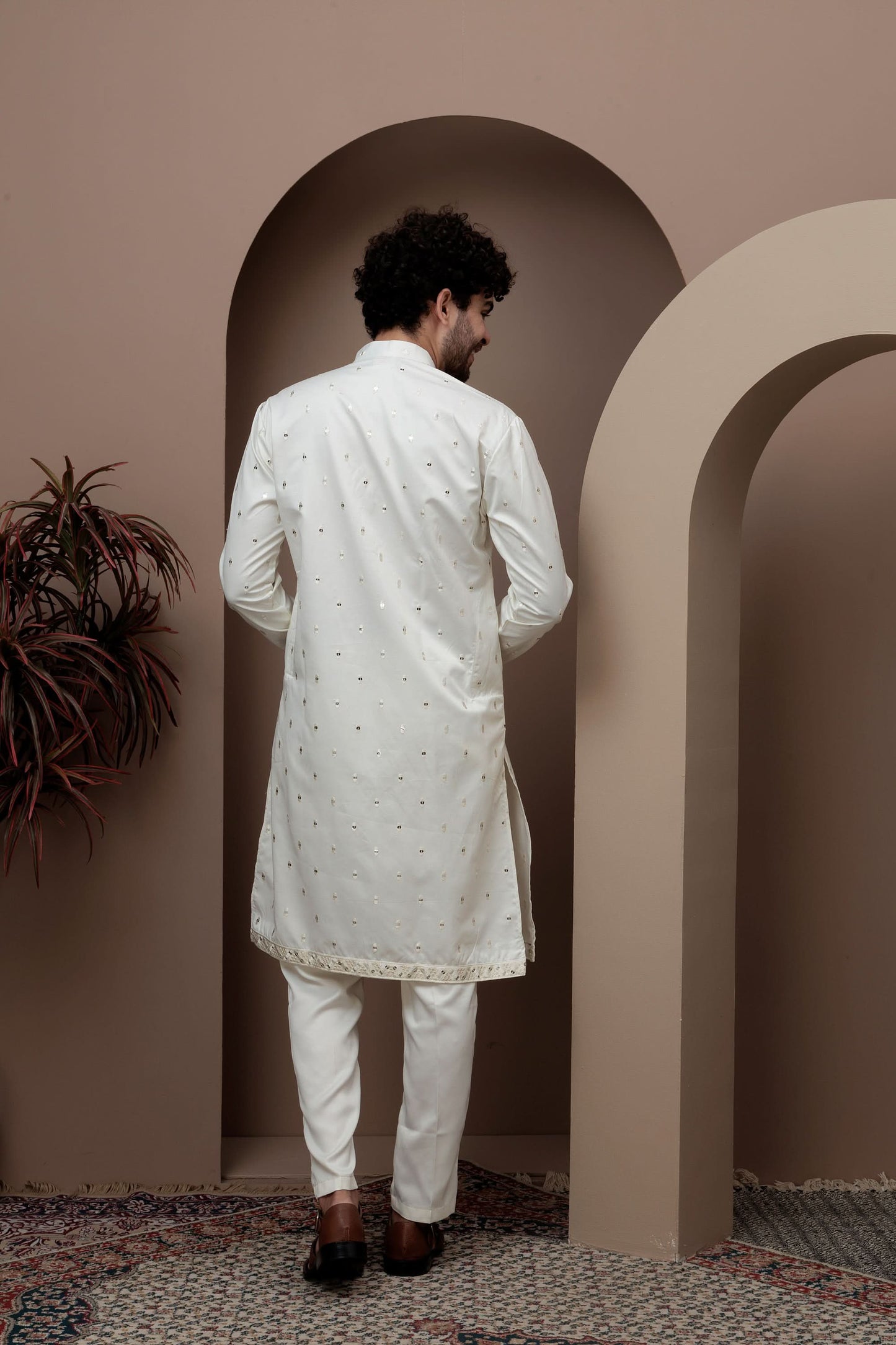 White kurta pajama with matching embroidered jacket