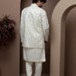 White kurta pajama with matching embroidered jacket