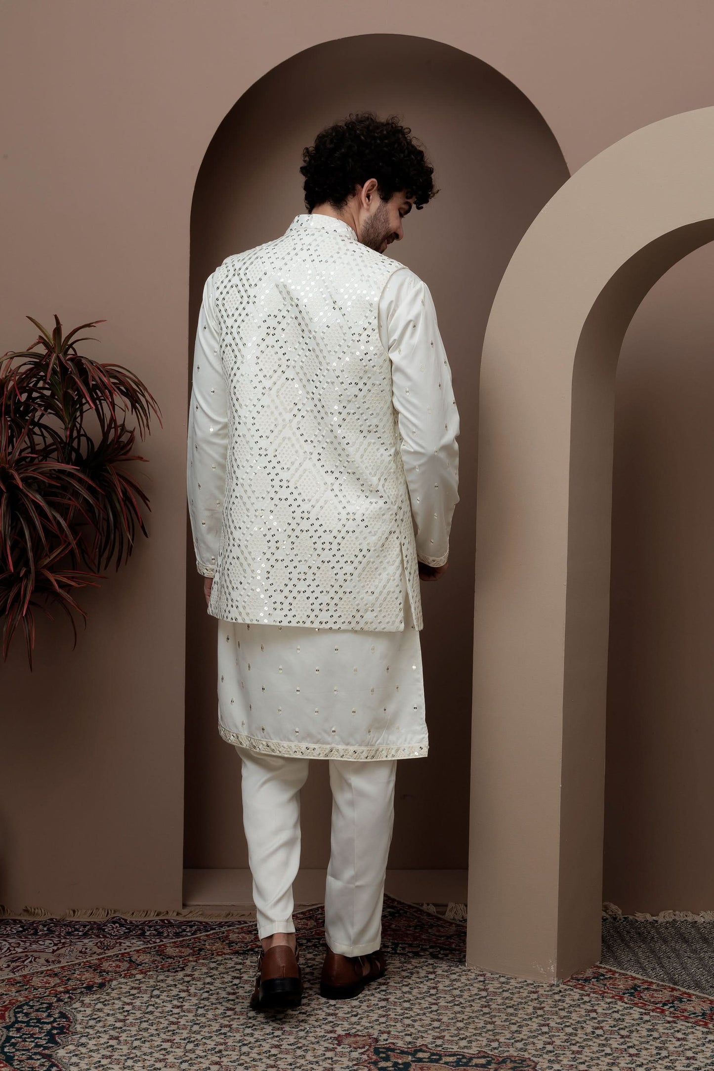 White kurta pajama with matching embroidered jacket