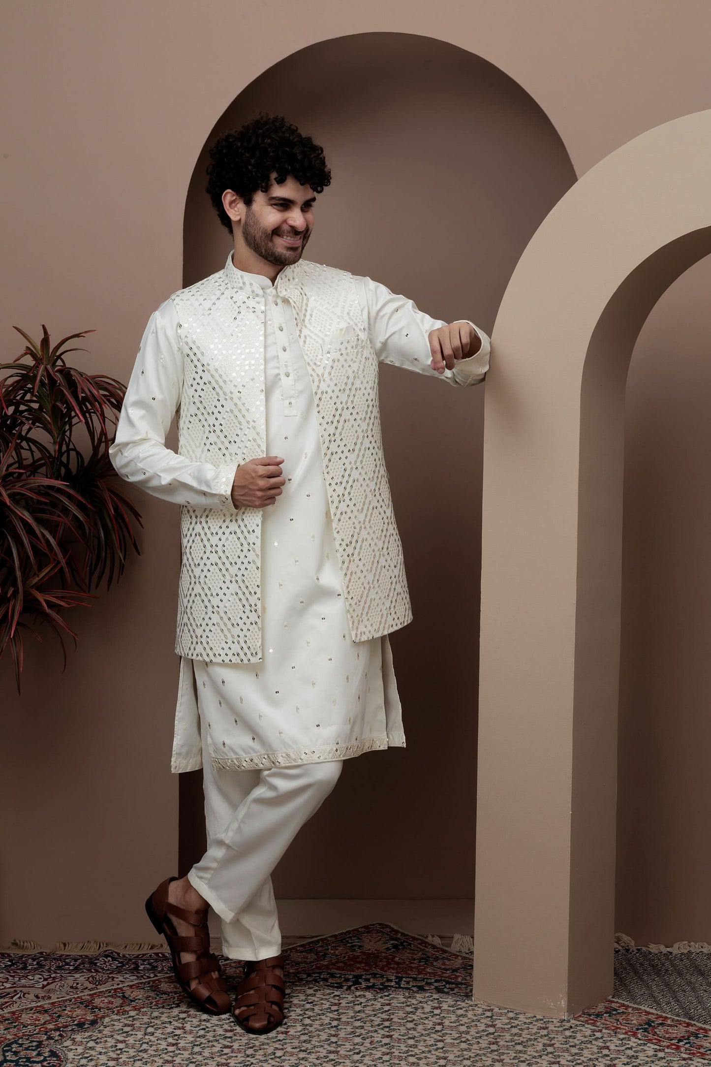 White kurta pajama with matching embroidered jacket