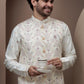 White kurta pajama with matching embroidered jacket