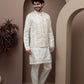 White kurta pajama with matching embroidered jacket