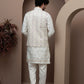 White kurta pajama with matching embroidered jacket
