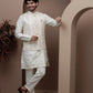 White kurta pajama with matching embroidered jacket