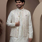 White kurta pajama with matching embroidered jacket