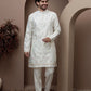 White kurta pajama with matching embroidered jacket