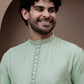 Green cotton silk kurta pajama for festive occasions
